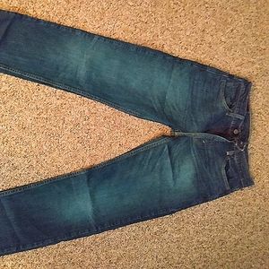 Men's Levi's, style 502, strait leg, size 29 x 32. Blue